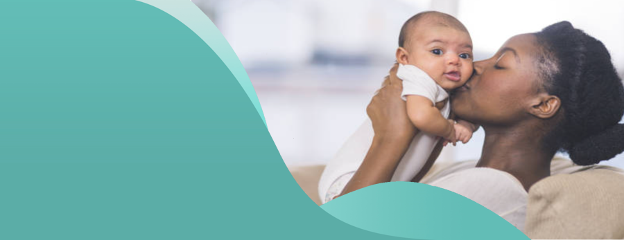 banner mother kissing baby