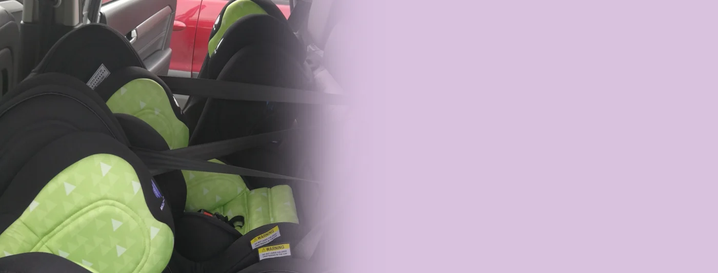 fitting three car seats across the back seat